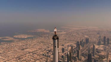 Nicole Lundvik-Smith standing on top of the Burj Khalifa's spire in a viral advertising video for Dubai's Emirates airline. (Dubai Media Office)