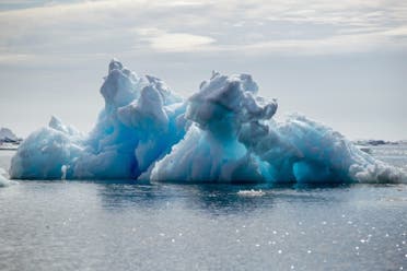 An iceberg floats on water near a gorge in Greenland. (File photo: Reuters)