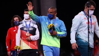Ukrainian Olympic gold medalist wrestler says he was racially abused in the street