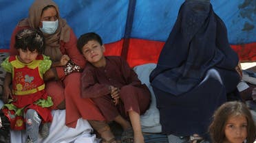 Internally displaced families from northern provinces, who fled from their homes due the fighting between Taliban and Afghan security forces, take shelter in a public park in Kabul, Afghanistan, on August 10, 2021. (Reuters)
