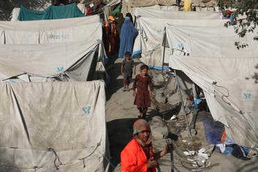 Internally displaced Afghans from northern provinces, who fled their home due to fighting between the Taliban and Afghan security personnel, take refuge in a public park Kabul, Afghanistan, Friday, Aug. 13, 2021. (AP)