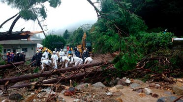 InNagasaki Kenou Wide Area Fire Department, rescuers work at a mudslide site following heavy rain in Obama, Unzen city, Nagasaki Prefecture, Saturday, Aug. 14, 2021. Torrential rain pounding southwestern Japan triggered a mudslide that swallowed four people and was threatening to cause flooding and more landslides in the region. The mudslide in Nagasaki prefecture hit two houses with four residents total. (Nagasaki Kenou Wide Area Fire Department.  (File ohoto: AP)