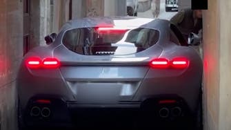 Ferrari Roma supercar gets stuck in narrow Italian road