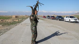 Afghan official says forces surrender Bagram air base to Taliban