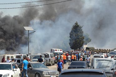 من انفجار خزان الوقود في منطقة عكار (فرانس برس) 