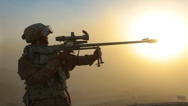  A Russian soldier looks through his sniper's rifle during a joint military drills by Russia, Tajikistan and Uzbekistan at Harb-Maidon firing range about 20 kilometers (about 12 miles) north of the Tajik border with Afghanistan, in Tajikistan, Tuesday, Aug. 10, 2021. The troops from Russia, Tajikistan and Uzbekistan on Tuesday wrapped up their drills intended to simulate a joint response to potential security threats coming from Afghanistan. The war games that began last week involved 2,500 Russian, Tajik and Uzbek troops and about 500 military vehicles. (AP)
