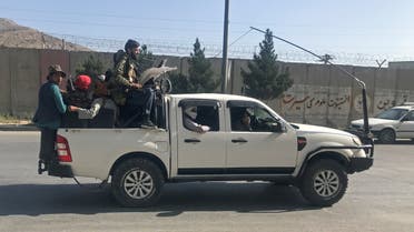 Taliban fighters ride on a vehicle in Kabul, Afghanistan, August 16, 2021. (Reuters)