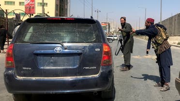 Members of Taliban forces gesture as they check a vehicle on a street in Kabul, Afghanistan, August 16, 2021. (Reuters)