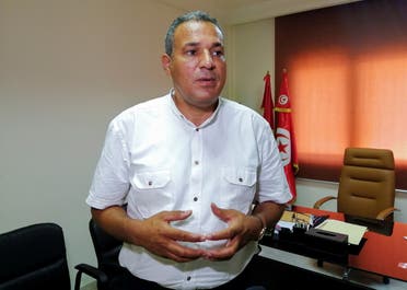 Mohamed Ali Boughdiri, deputy head of the UGTT union, attends an interview with Reuters in Tunis, Tunisia August 16, 2021. (Reuters)