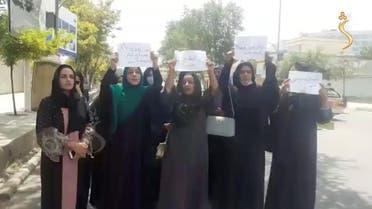 A group of women hold a street protest calling on the Taliban to protect their rights, in Kabul, Afghanistan August 17, 2021 in this still image taken from video dated August 17, 2021. Shamshad News/via REUTERS THIS IMAGE HAS BEEN SUPPLIED BY A THIRD PARTY. MANDATORY CREDIT. MUST NOT OBSCURE LOGO