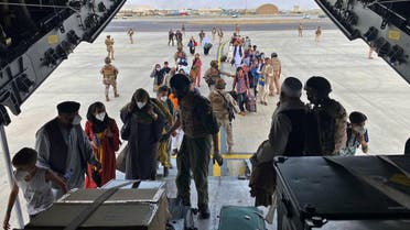 In this photo provided by the Spanish Defence Ministry and taken in Kabul, Afghanistan, people board a Spanish airforce A400 plane as part of an evacuation plan at Kabul airport in Afghanistan, Aug. 18, 2021. (AP)