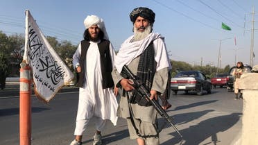 Taliban fighters stand outside the Interior Ministry in Kabul, Afghanistan, August 16, 2021. (Reuters)