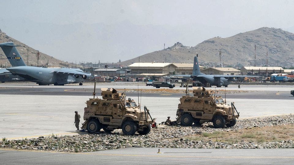 US Army soldiers assigned to the 82nd Airborne Division patrol Hamid Karzai International Airport in Kabul, Afghanistan August 17, 2021. (Reuters)