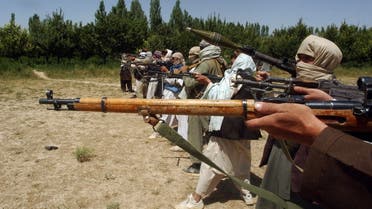 Taliban fighters train with their weapons in an undisclosed location in Afghanistan July 14, 2009. (File photo: Reuters)