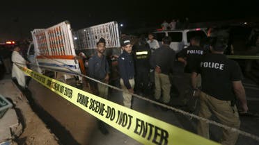 Police officers examine a truck at the site of an explosion, in Karachi, Pakistan, Saturday, Aug. 14, 2021. (File photo: AP)