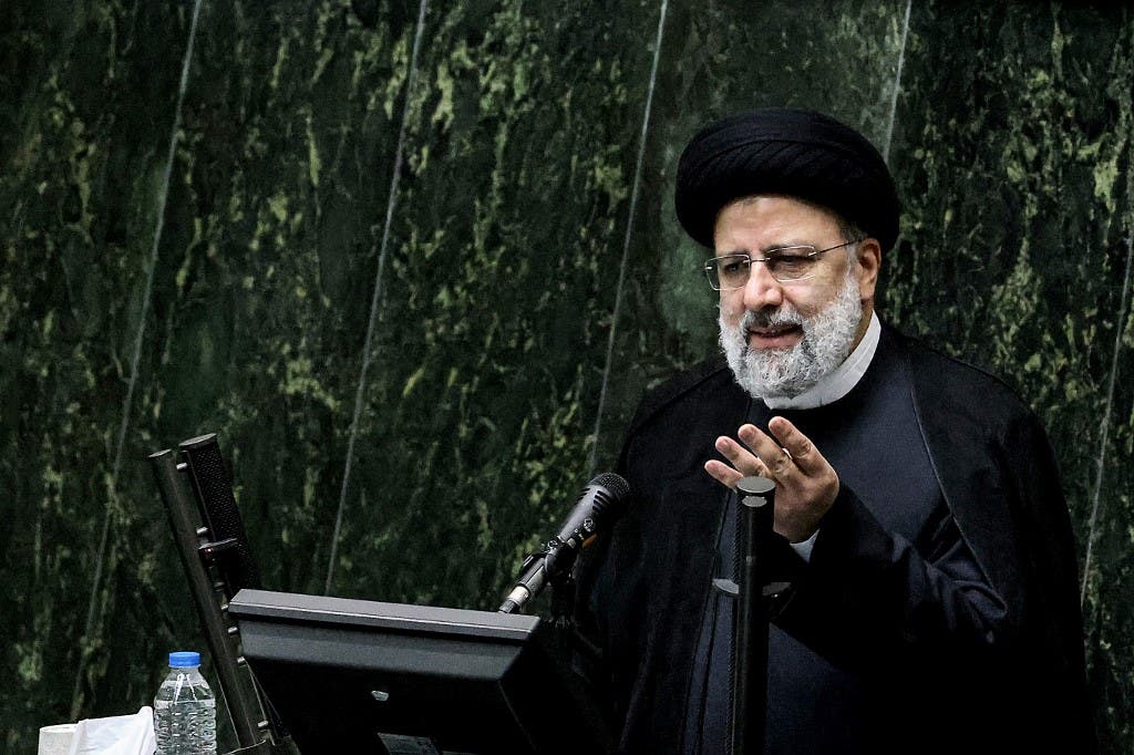 Iran’s President Ebrahim Raisi speaks before parliament to defend his cabinet selection in the capital Tehran on August 21, 2021. (AFP)