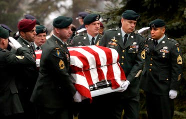 US Army Special Forces soldiers carry the casket containing the body of Sergeant First Class Daniel Petithory at his funeral at St. Mary of the Assumption Church in Petithory's hometown of Cheshire, Massachusetts December 13, 2001. Petithory was killed December 5 when an American bomb landed about 100 yards from their position north of Kandahar, Afghanistan. (Reuters)
