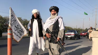 A Taliban fighter holding an M16 assault rifle stands outside the Interior Ministry in Kabul, Afghanistan, August 16, 2021. (File photo: Reuters)