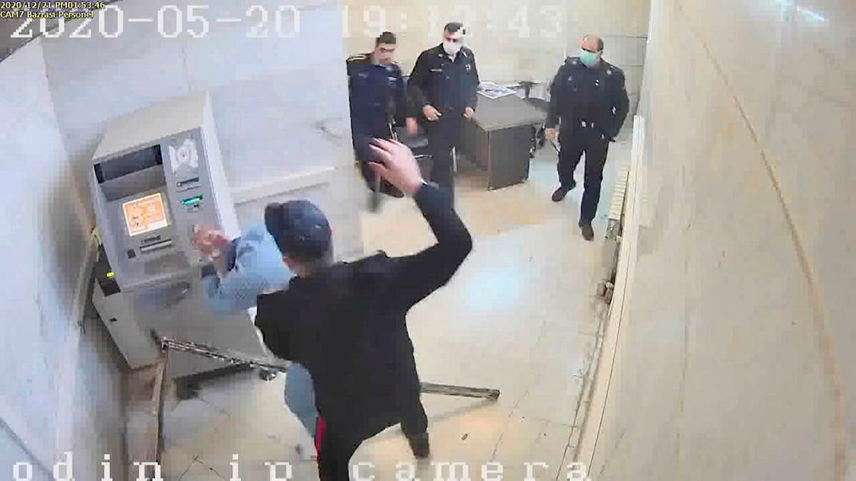 A guard beats a prisoner, at Evin prison in Tehran, Iran in this undated frame grab taken from video shared with The Associated Press by a self-identified hacker group called “The Justice of Ali.” (The Justice of Ali/AP)