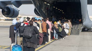 Evacuees assemble before boarding a C-17 Globemaster III during an evacuation at Hamid Karzai International Airport, Afghanistan, August 18, 2021. (File photo: Reuters)