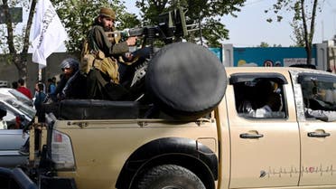 Taliban fighters travel with weapons mounted on a vehicle in Kabul on August 19, 2021 after Taliban's military takeover of Afghanistan. (AFP)