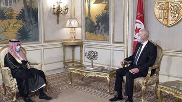 In this handout picture provided by the Tunisian Presidency Press Service, Tunisian President Kais Saied meets Saudi Foreign Minister Prince Faisal bin Farhan (L) at Carthage Palace in Carthage, some 15 kilometres on the outskirts of Tunis, on July 28, 2020. (AFP)
