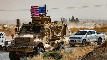Syrian Kurds gather around a US armored vehicle during a demonstration against Turkish threats in Syria's Hasakeh. (File Photo: Reuters)
