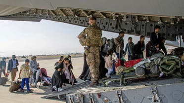 British citizens and dual nationals residing in Afghanistan board a military plane for evacuation from Kabul airport, Afghanistan August 16, 2021, in this handout picture obtained by Reuters on August 17, 2021. (Reuters)
