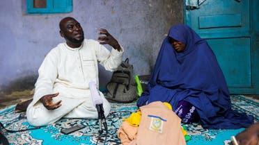 Abubakar Adam and wife, parents of seven children kidnapped at Salihu Tanko Islamic school by bandits, speak during an interview with Reuters at their house in Tegina, Niger State, Nigeria August 11, 2021. (Reuters)
