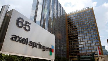 The logo of German publisher Axel Springer is pictured in front of the company's headquarters in Berlin. (File Photo: Reuters)