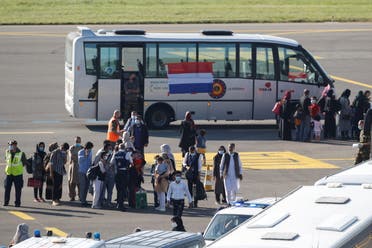 People who have been evacuated from Afghanistan arrive at Melsbroek military airport after Taliban insurgents entered Afghanistan's capital Kabul, Melsbroek, Belgium, August 25, 2021. (Reuters)