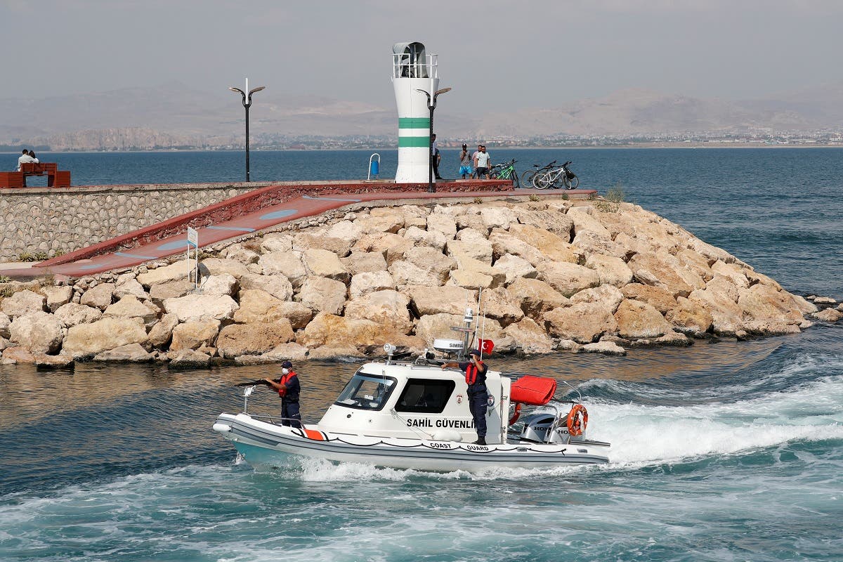 A Turkish Coast Guard boat returns from a patrol at Lake Van in the border city of Van, Turkey, on August 22, 2021. (Reuters)