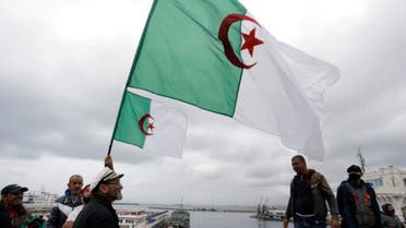 Algerians demonstrate with flags along the docks of Algiers, April 16, 2021. (AP)