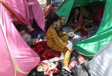 Internally displaced families from northern provinces, who fled from their homes due the fighting between Taliban and Afghan security forces, take shelter in a public park in Kabul, Afghanistan, August 10, 2021. (Reuters)