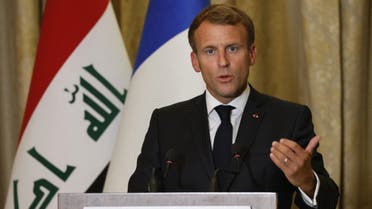 French President Emmanuel Macron holds a press conference at the guest house in the Iraqi capital Baghdad on August 28, 2021.  (AFP)