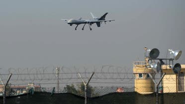 A US drone aircraft lands at Afghanistan's Jalalabad Airport where a US C-130 military transport plane crashed in Jalalabad on October 2, 2015. The Taliban claimed October 1 to have shot down a US military transport plane in eastern Afghanistan in a crash that killed 11 people, as the battle for Kunduz raged after the emboldened militants briefly seized the city.The Taliban's stunning success in Kunduz, their biggest tactical success since 2001, marks a blow for Afghanistan's NATO-trained forces, who have largely been fighting on their own since December 2014. NATO has not yet confirmed the cause of Friday's crash. The Taliban regularly claim to have shot down military aircraft.Our mujahideen have shot down a four-engine US aircraft in Jalalabad, Taliban spokesman Zabihullah Mujahid said on Twitter.Based on credible information 15 invading forces and a number of puppet troops were killed. AFP PHOTO / Noorullah Shirzada