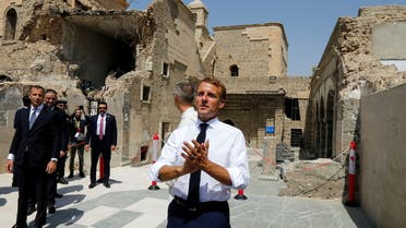 French President Emmanuel Macron visits al-Sa'ah church in the Old City of Mosul, Iraq, August 29, 2021. (Reuters)