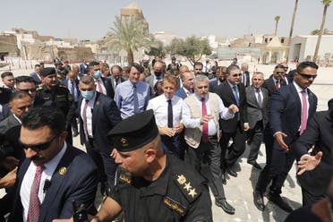 ماكرون خلال زيارته إلى الموصل (أ ف ب)