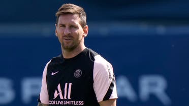 Lionel Messi walks on the pitch at the Paris Saint-Germain training camp in Saint-Germain-en-Laye, west of Paris, Friday, Aug. 13, 2021. (AP)