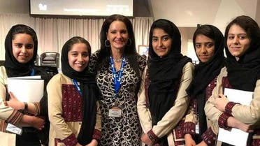 Allyson Reneau (center) is pictured with members of the Afghan girls robotics teams. (Twitter)