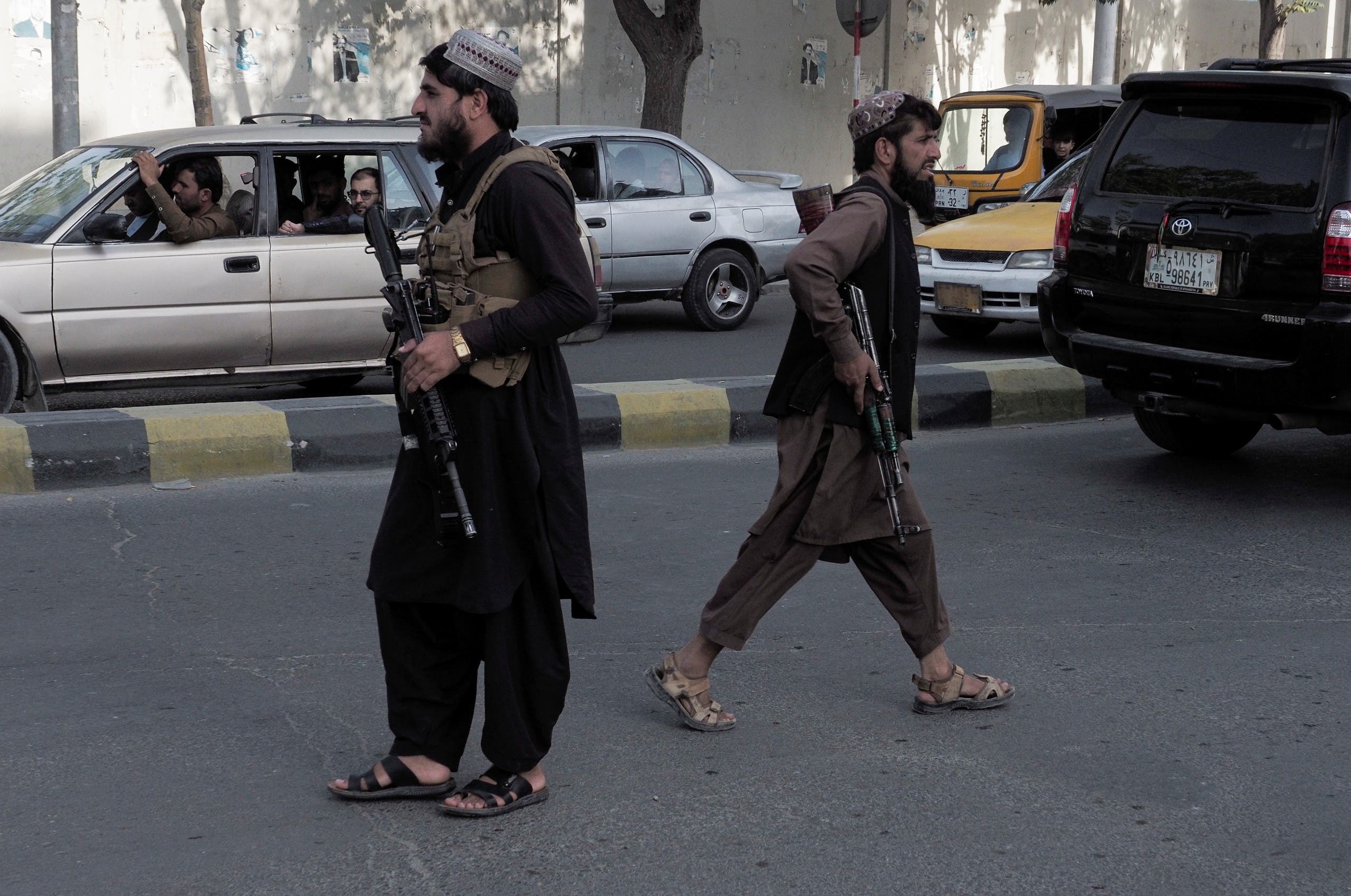 جنگجویان طالبان در خیابانی در کابل (رویترز)