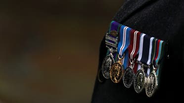 A veteran wears his medals during the Remembrance Day at the Commando Memorial, in Spean Bridge, Scotland, Britain, November 8, 2020. (Reuters)