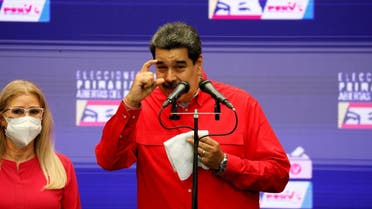 Venezuelan President Nicolas Maduro speaks to the media after voting in the ruling Socialist Party primaries for the November regional elections for governors and mayors, in Caracas, Venezuela August 8, 2021. (Reuters/Leonardo Fernandez Viloria)