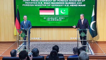 Pakistan’s Foreign Minister Shah Mahmood Qureshi (R) along with his German counterpart, Heiko Maas addresses a news conference in Islamabad, Pakistan, on August 31, 2021. (Reuters)