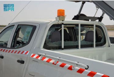 A truck that belongs to airport staff members was damaged after a Houthi drone was destroyed. (SPA)