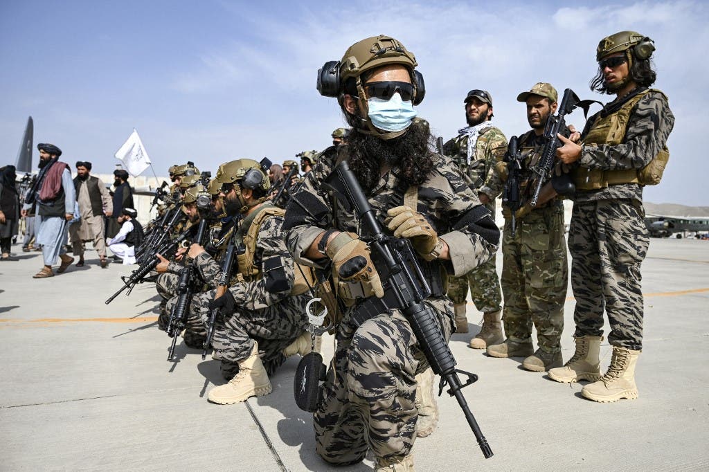 Members of the Taliban Badri 313 military unit take a position at the airport in Kabul on August 31, 2021, after the US has pulled all its troops out of the country. (AFP)