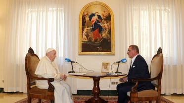 Pope Francis and journalist Carlos Herrera talk during an interview with Spanish radio station COPE at the Vatican City in this picture released on September 1, 2021. (Reuters)