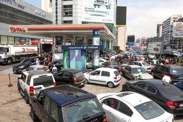 People wait in cars to get fuel at a gas station in Zalka, Lebanon, August 20, 2021. (Reuters)