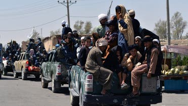 Taliban fighters atop Humvee vehicles prepare before parading along a road to celebrate after the US pulled all its troops out of Afghanistan, in Kandahar on September 1, 2021 following the Taliban’s military takeover of the country.