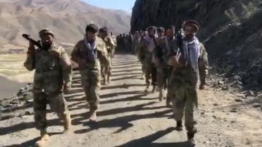 Anti-Taliban resistance troops walk in Panjshir Valley, Afghanistan, on August 25, 2021 in this still image taken from video. (Reuters)